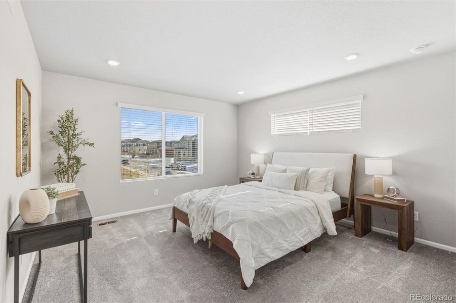 Furnished interior view inside a new home in Woodrose at Painted Prairie, Aurora (Image 10).