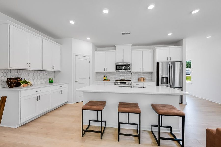 Furnished interior view inside a new home in Forestville Station, Wake Forest (Image 2).