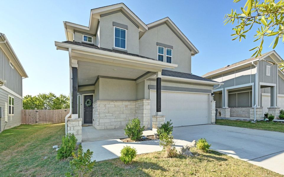 Exterior details and patio area of a home in Porter Country, Buda (Image 27).
