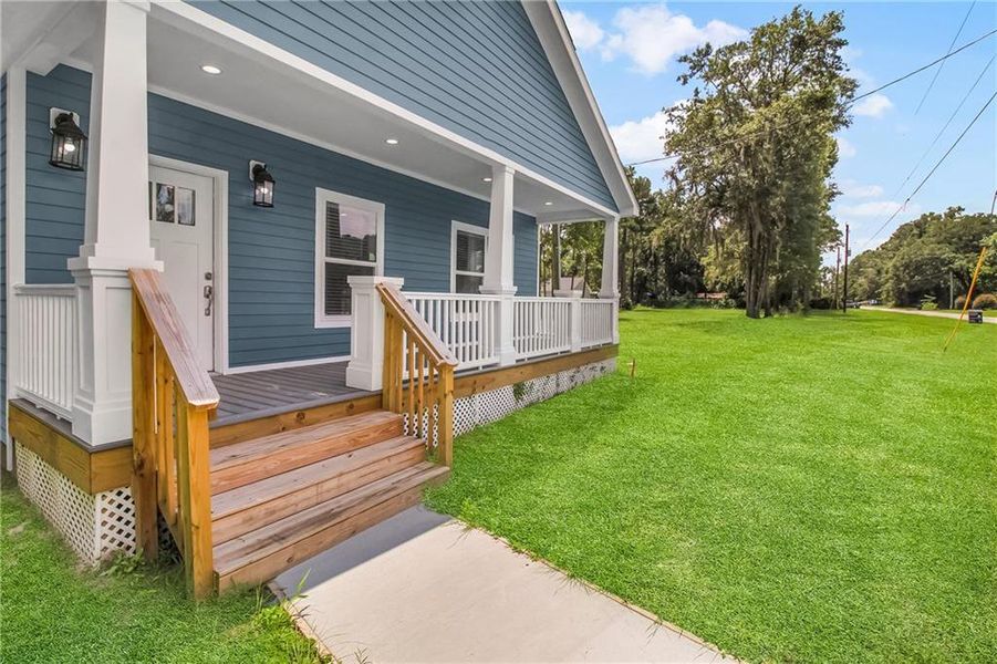 Front exterior of a new home in , Ludowici, GA, highlighting curb appeal (Image 1). Front exterior of a new home in , Ludowici, GA, highlighting curb appeal (Image 1).