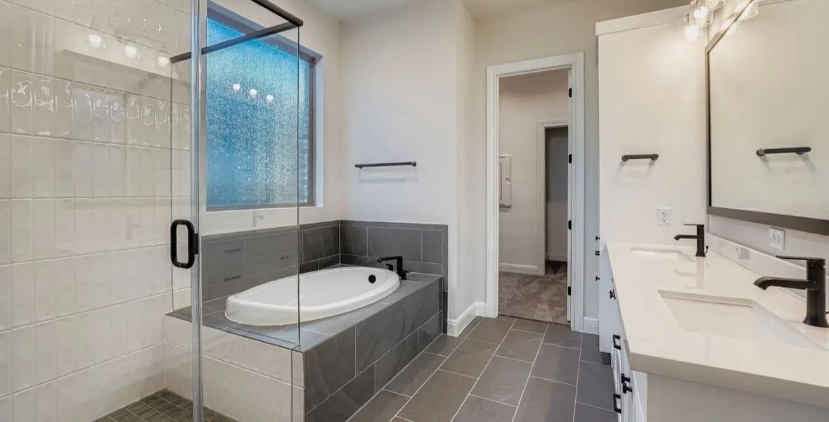 Furnished interior view inside a new home in 6 Creeks, Kyle (Image 5).