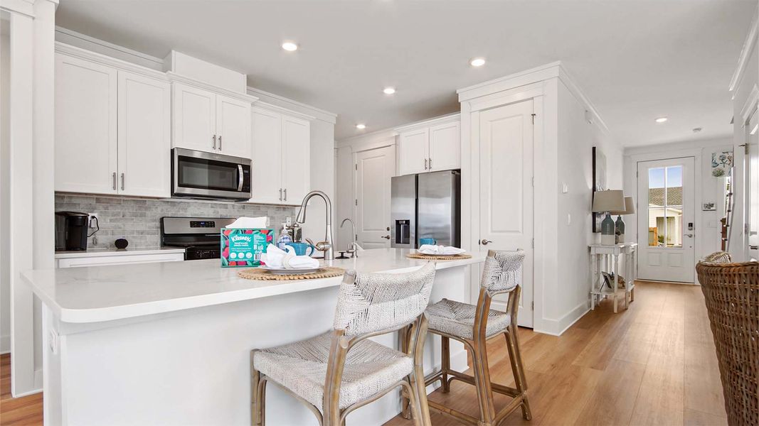 Furnished interior view inside a new home in Breakfast Point East Phase I, Panama City Beach (Image 5).