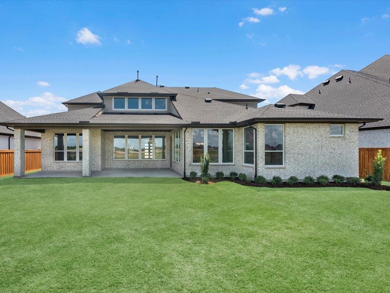 Exterior details and patio area of a home in Dunham Pointe, Cypress (Image 3).