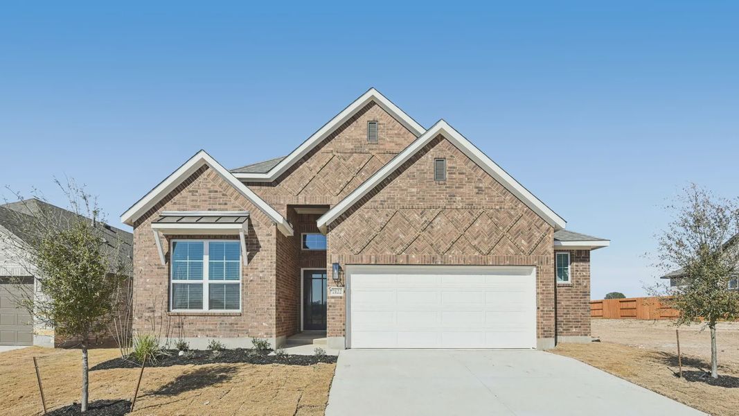 Representative exterior photo of a completed home built from the Marshall by Chesmar Homes in Stream Waters, Seguin, TX (Image 1). Representative exterior photo of a completed home built from the Marshall by Chesmar Homes in Stream Waters, Seguin, TX (Image 1).