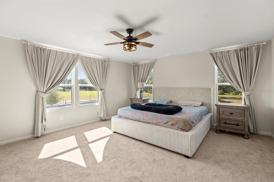 Furnished interior view inside a new home in Seasons at Lakeside Forest, Tavares (Image 18).