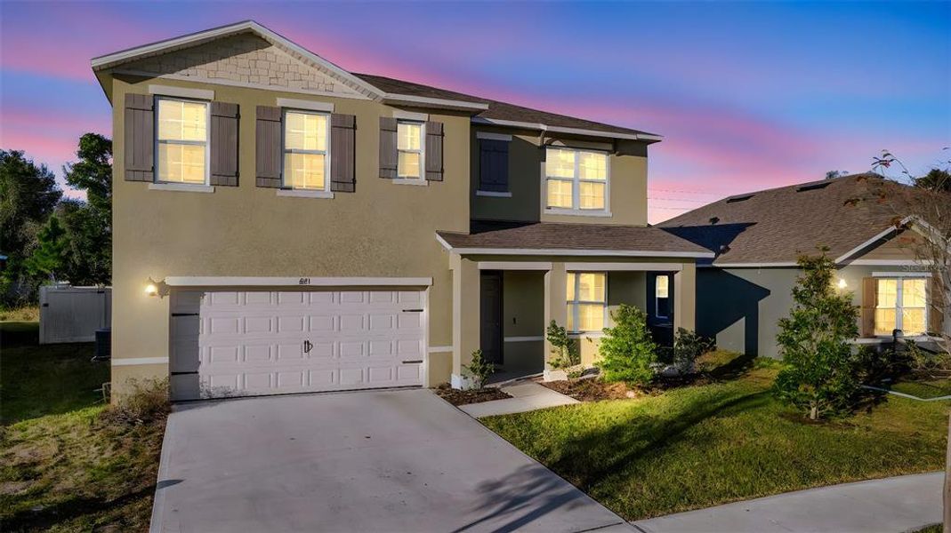 Front exterior of a new home in Cadence at Parc Hill, Orange City, FL, highlighting curb appeal (Image 24).