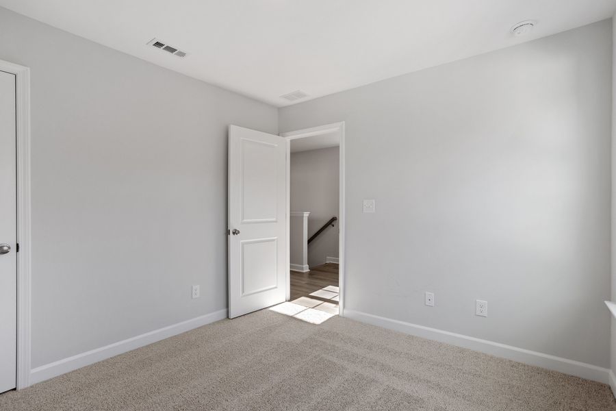 Spacious, unfurnished interior of a new home in Renaissance at White Oak, Garner (Image 25).