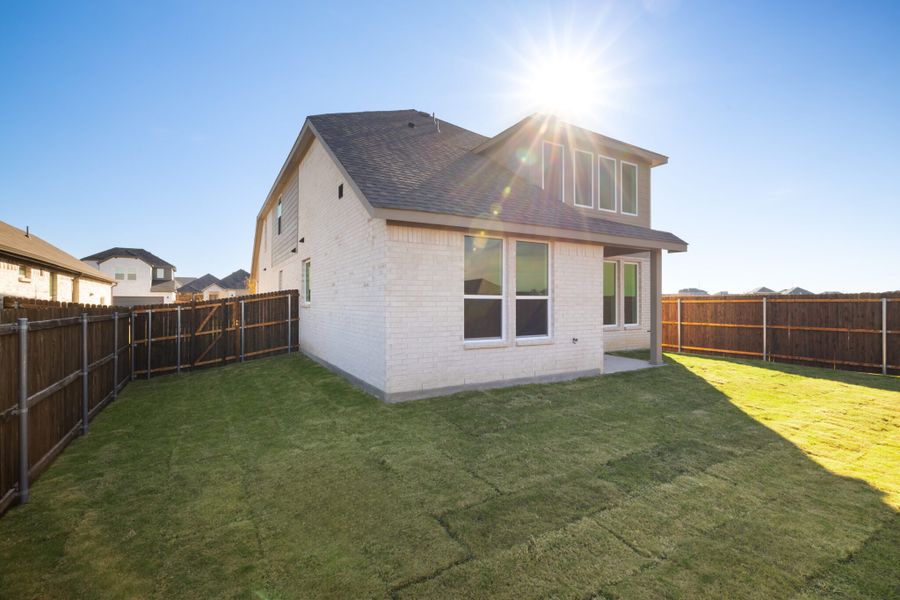 Exterior details and patio area of a home in Elevon, Lavon (Image 21).