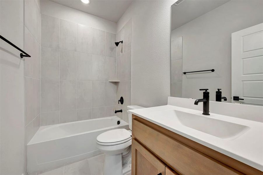 Furnished interior view inside a new home in Pecan Square - Gardens, Northlake (Image 16).