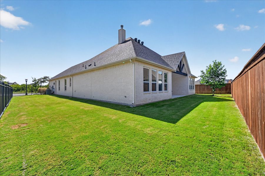 Front exterior of a new home in LeTara, Haslet, TX, highlighting curb appeal (Image 21).