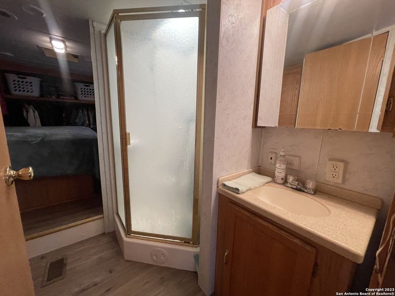 Furnished interior view inside a new home in , Bandera (Image 55).