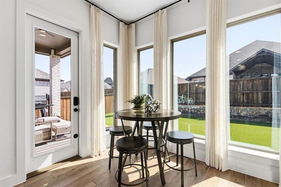 Breakfast Area over looks rear yard with artificial turf