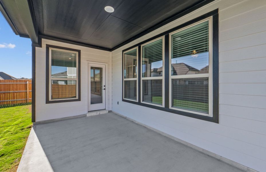 Exterior details and patio area of a home in Santa Rita Ranch, Liberty Hill (Image 30). Exterior details and patio area of a home in Santa Rita Ranch, Liberty Hill (Image 30).