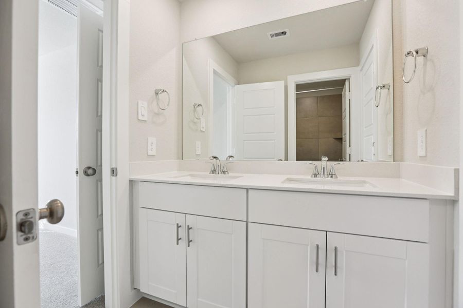 Photos are not of the actual home, but are photos of the builder home with same floorplan with similar interior finishes.