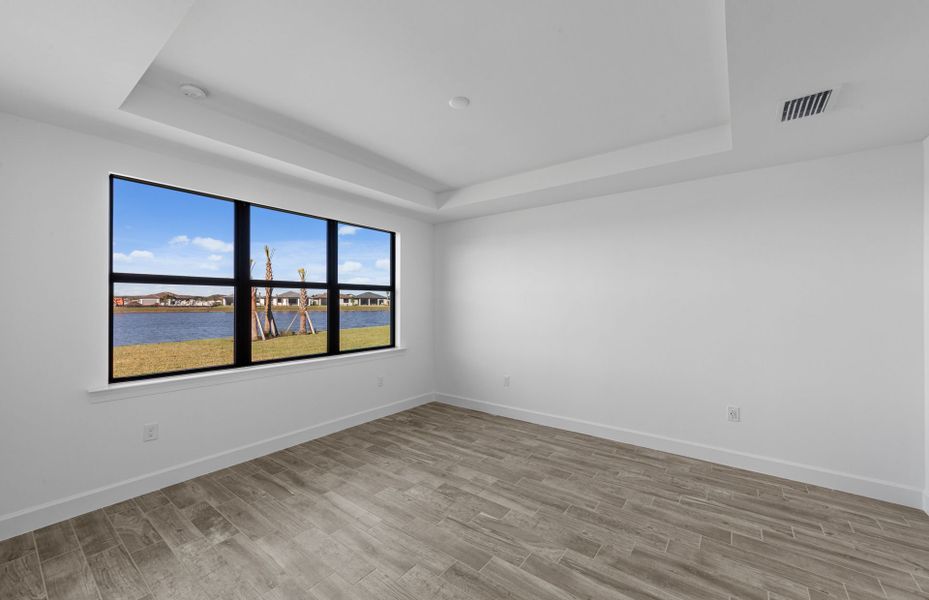 Spacious, unfurnished interior of a new home in Del Webb Naples, Ave Maria (Image 16).