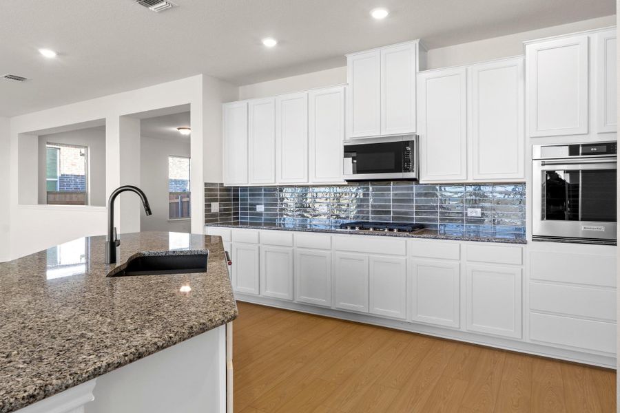 Furnished interior view inside a new home in Salerno - Classic Collection, Round Rock (Image 14).