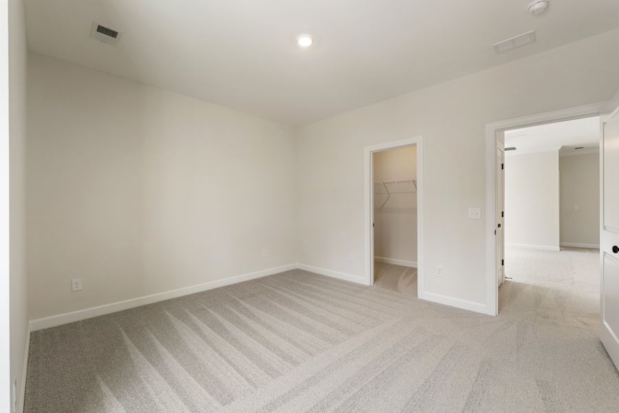 Spacious, unfurnished interior of a new home in Landing at Pine Lake, Anderson (Image 35).