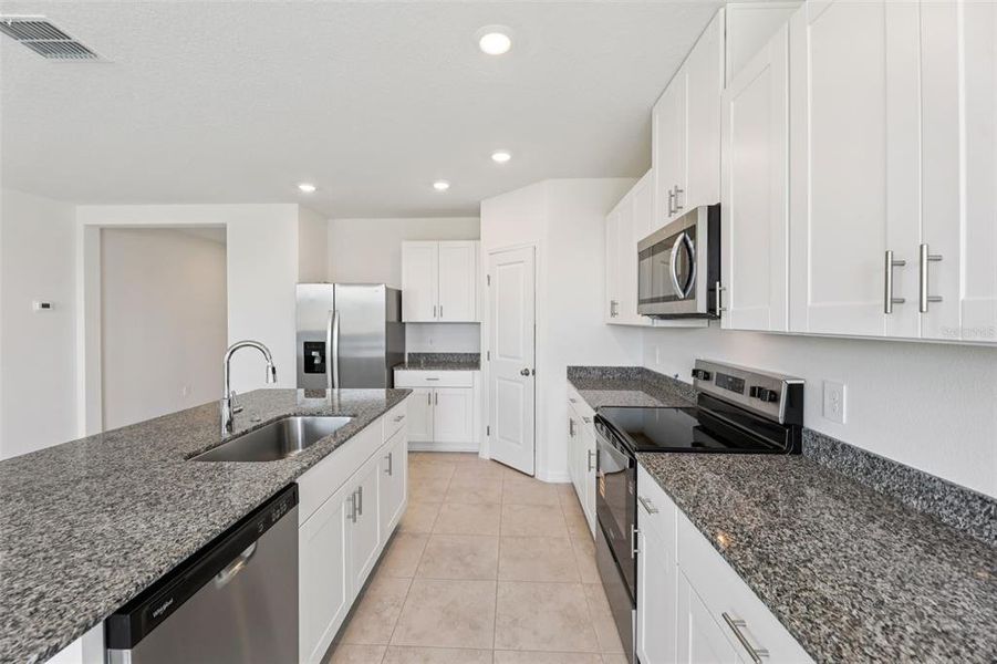 Furnished interior view inside a new home in Crosswinds - Signature Series, Haines City (Image 6).