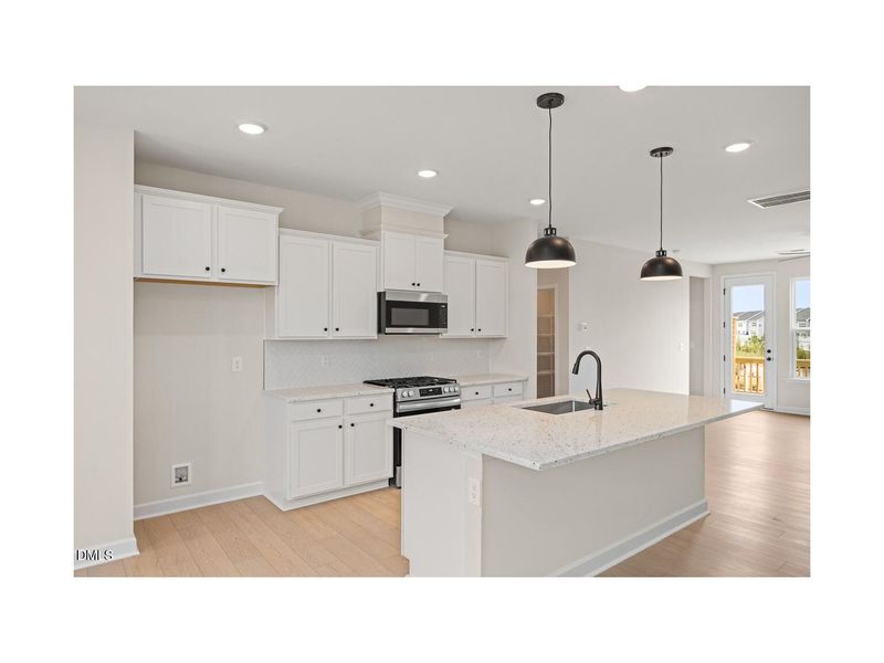 Furnished interior view inside a new home in Forestville Yard Townhomes, Knightdale (Image 2). Furnished interior view inside a new home in Forestville Yard Townhomes, Knightdale (Image 2).