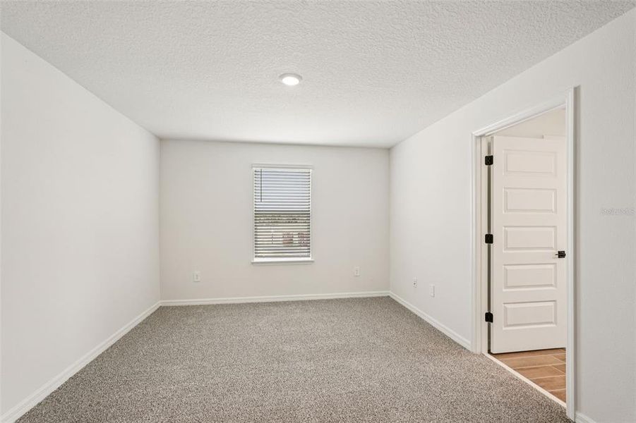 Spacious, unfurnished interior of a new home in Oakfield Trails - Signature Series, Parrish (Image 30).