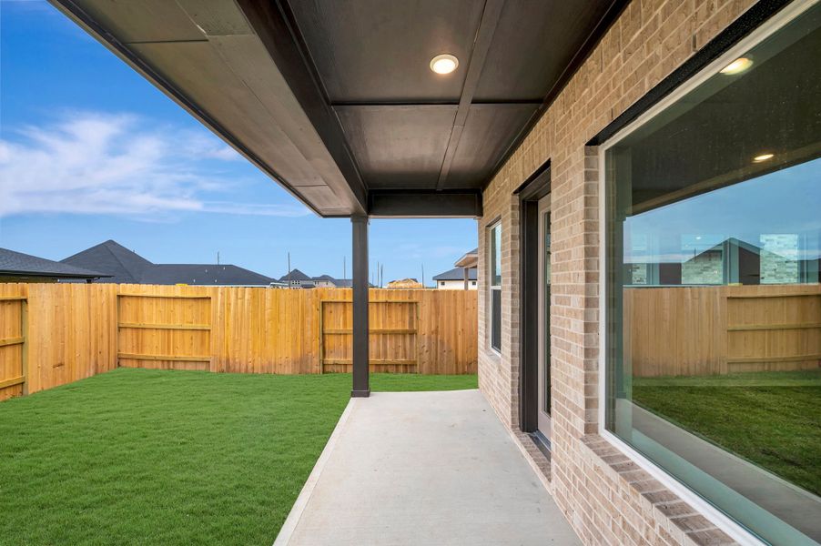 Exterior details and patio area of a home in The Grand Prairie - Retreat Collection, Hockley (Image 3).