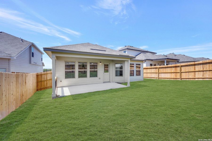Exterior details and patio area of a home in Mesquite Ridge, San Antonio (Image 4).