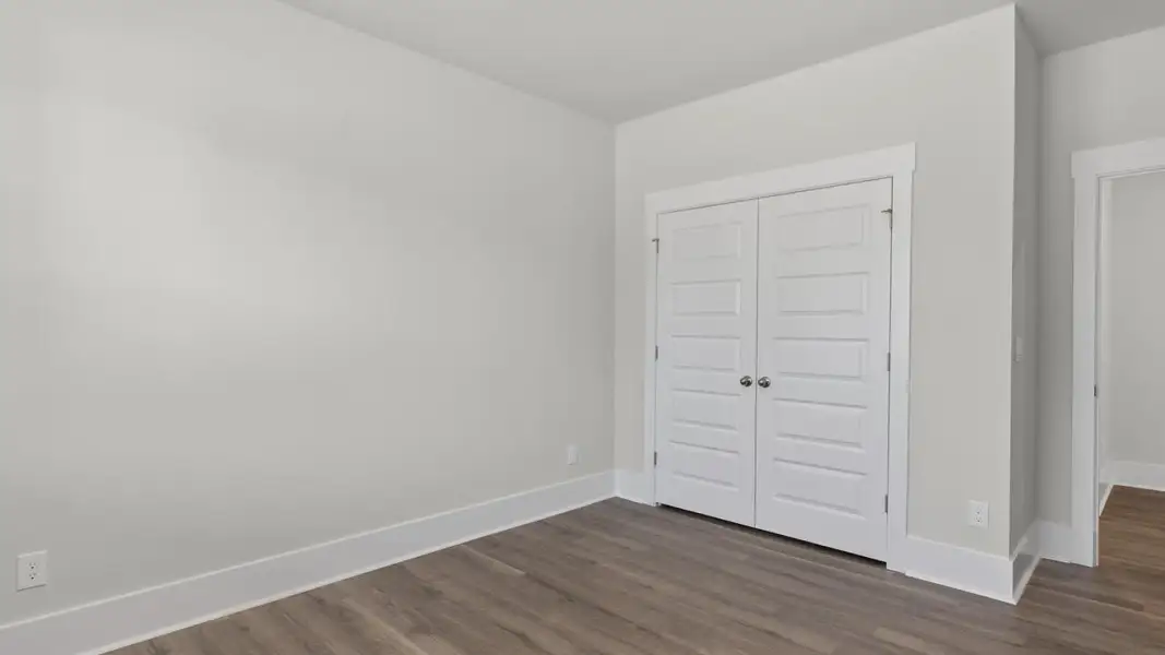 Spacious, unfurnished interior of a new home in The Highlands at Cedar Hill Landing, Navassa (Image 20).