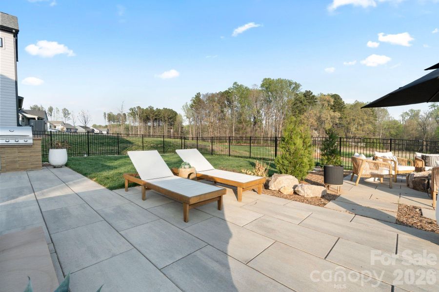 Exterior details and patio area of a home in Amara Chase, Huntersville (Image 26).