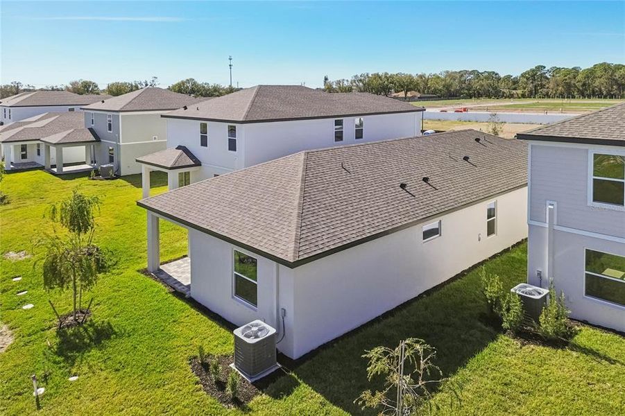 Exterior details and patio area of a home in Southpointe, Palmetto (Image 3).