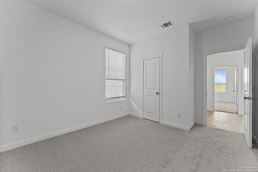 Spacious, unfurnished interior of a new home in Waterwheel: Coastline Collection, San Antonio (Image 11).