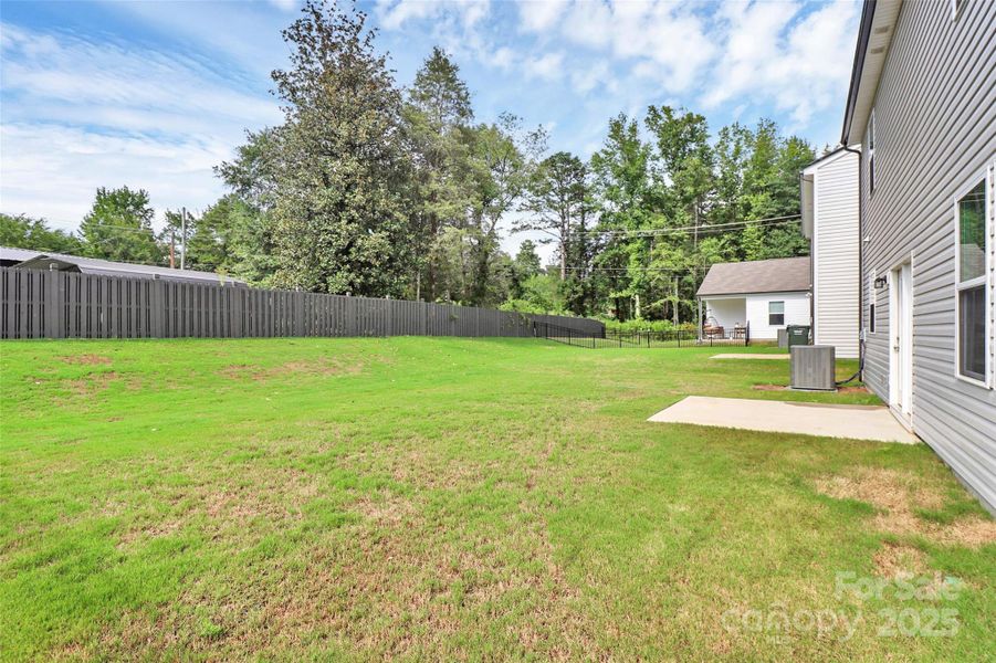 Front exterior of a new home in Sunbriar, Charlotte, NC, highlighting curb appeal (Image 18).