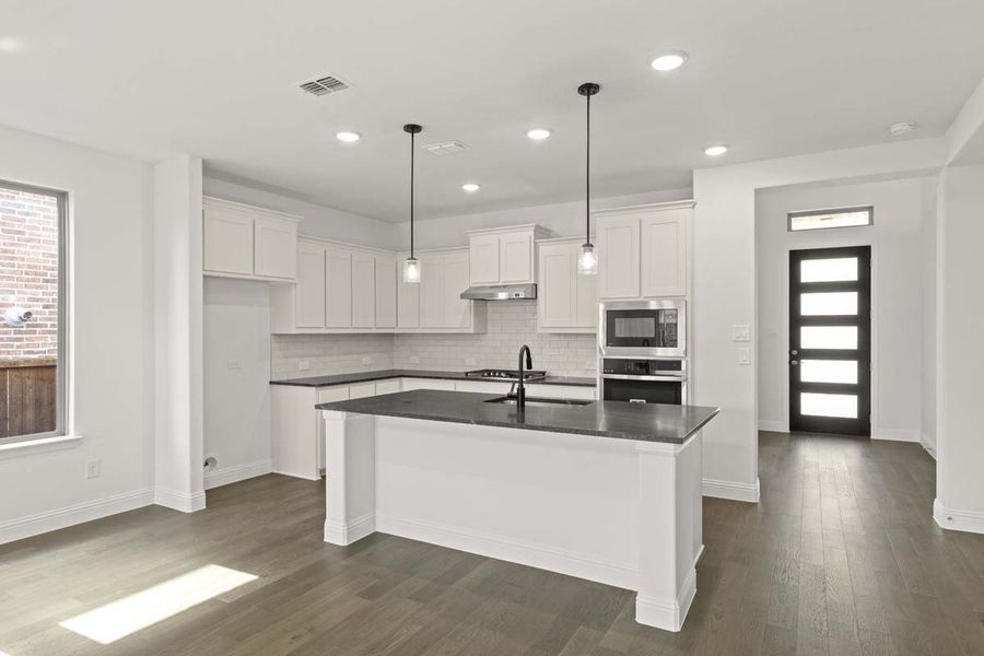 Furnished interior view inside a new home in Meadow Run, Melissa (Image 6).
