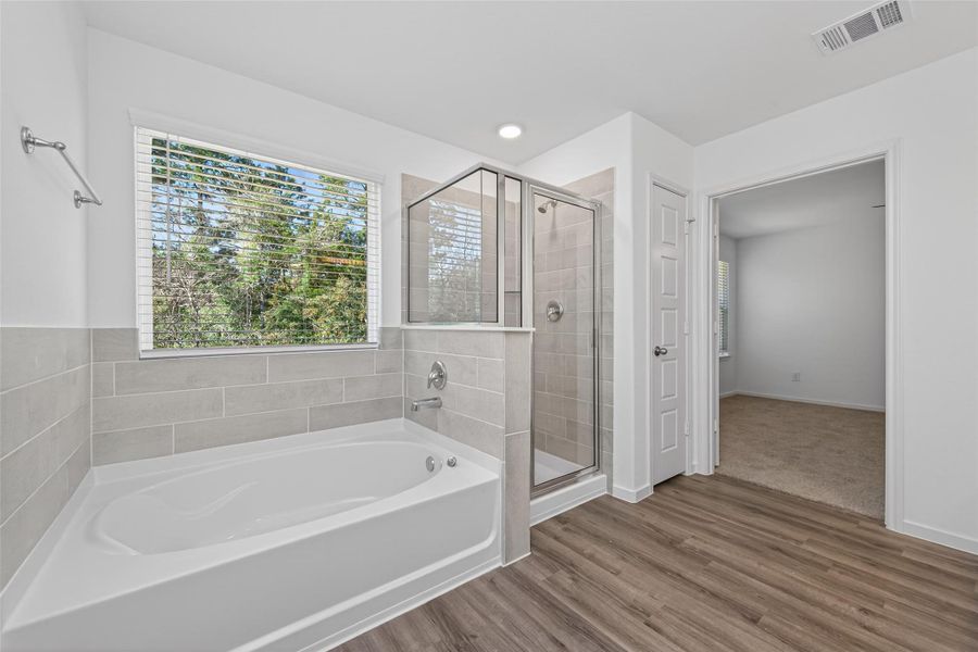 Furnished interior view inside a new home in Enclave at Willis, Willis (Image 15).