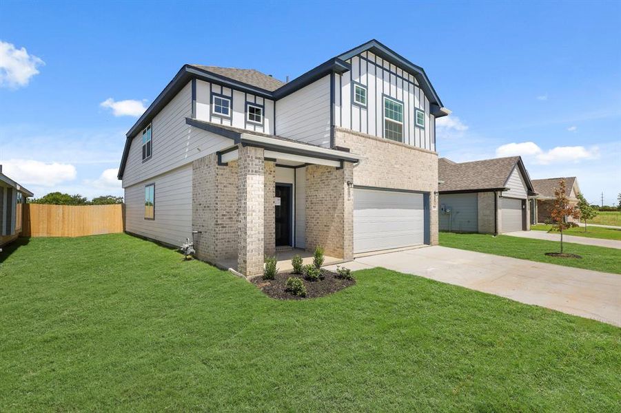 Front exterior of a new home in Rocky Creek Crossing, Fort Worth, TX, highlighting curb appeal (Image 2). Front exterior of a new home in Rocky Creek Crossing, Fort Worth, TX, highlighting curb appeal (Image 2).