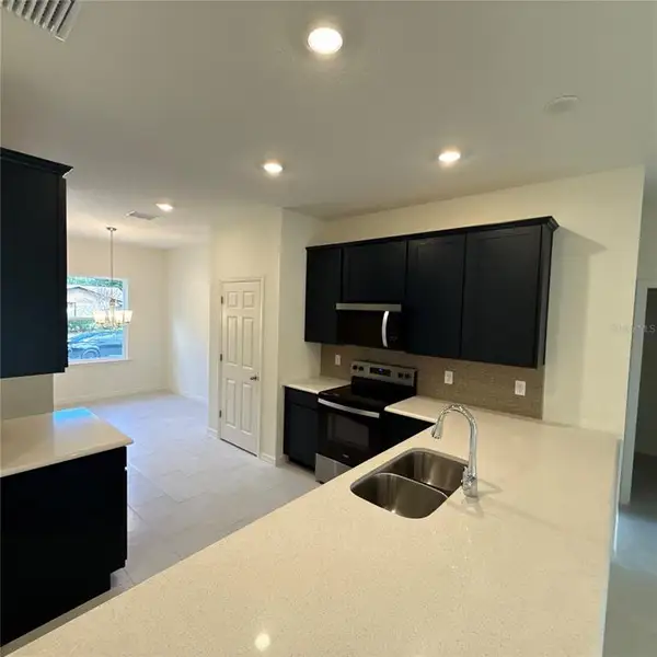 Furnished interior view inside a new home in Palm Coast: Value Collection, Palm Coast (Image 6).