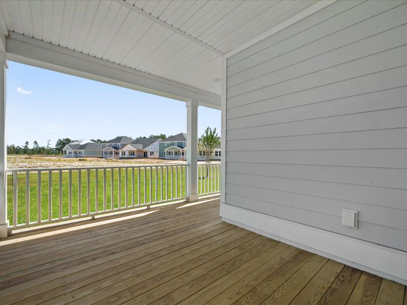 Exterior details and patio area of a home in The Coves at Lakes of Cane Bay, Summerville (Image 3).