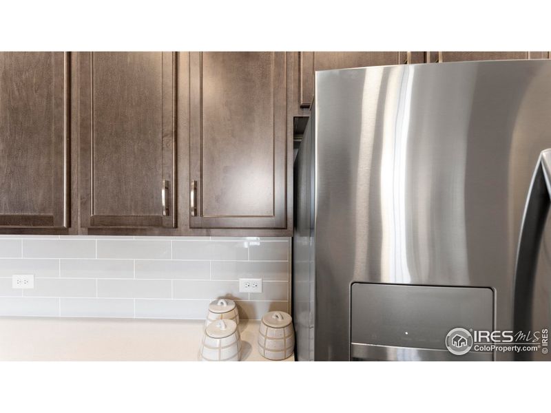 Kitchen - photos not of actual unit - finishes may vary Kitchen - photos not of actual unit - finishes may vary