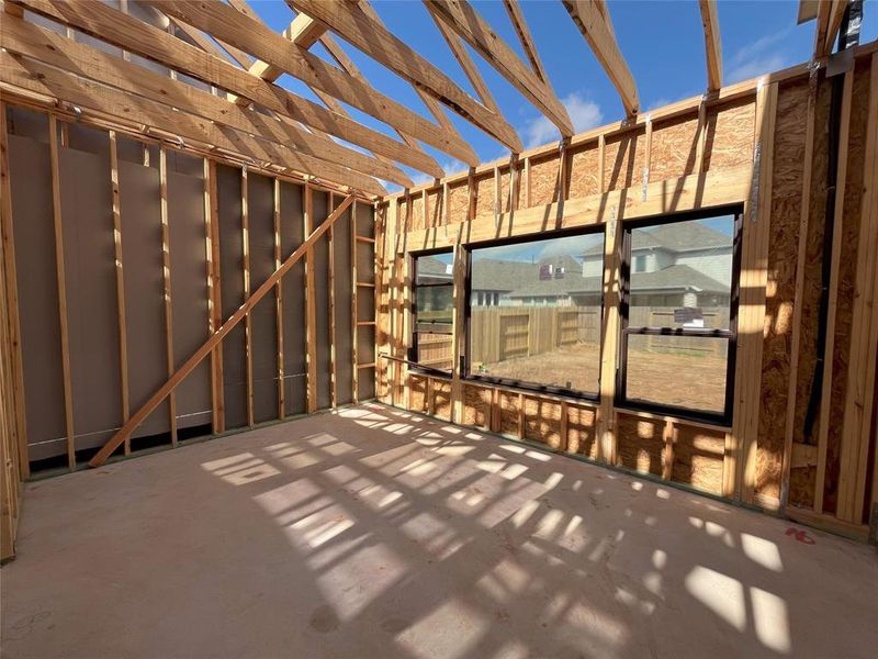 Primary bedroom with huge window.