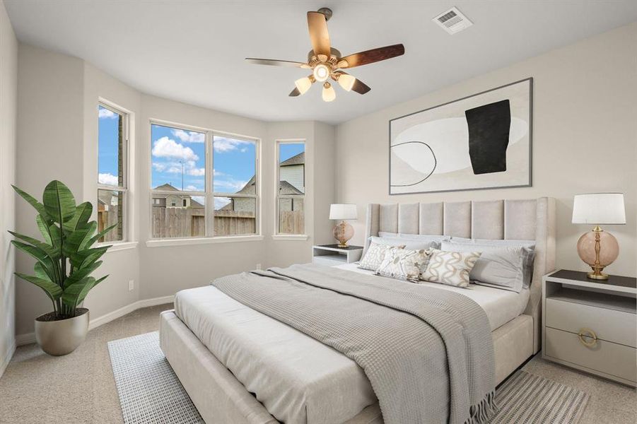 The primary bedroom is generously sized, creating a tranquil and spacious retreat that offers ample room for relaxation. Featuring plush carpet, high ceilings, fresh paint, and large windows that lets in natural lighting throughout the day.