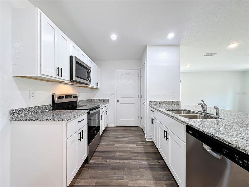 Furnished interior view inside a new home in , Crescent City (Image 9).