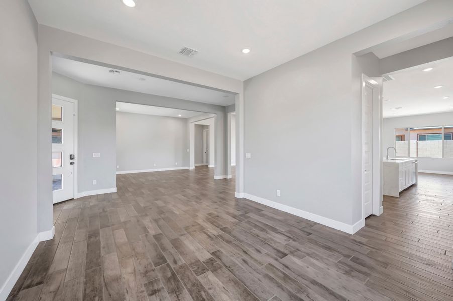 Spacious, unfurnished interior of a new home in Blossom Rock, Apache Junction (Image 32). Spacious, unfurnished interior of a new home in Blossom Rock, Apache Junction (Image 32).