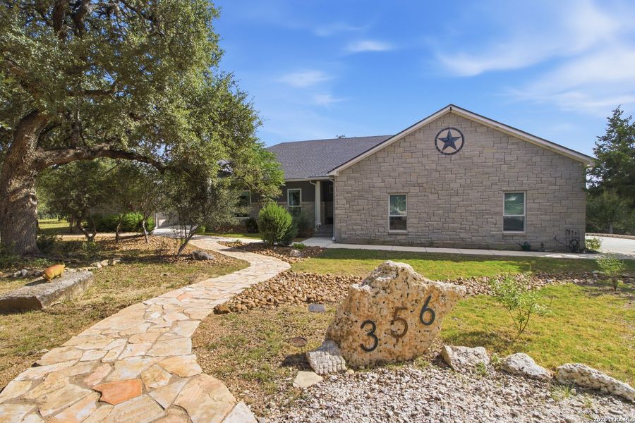 Front exterior of a new home in , Bandera, TX, highlighting curb appeal (Image 2). Front exterior of a new home in , Bandera, TX, highlighting curb appeal (Image 2).