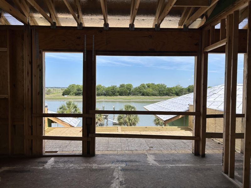 Spacious, unfurnished interior of a new home in , Isle Of Palms (Image 12).