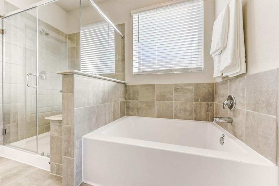 Furnished interior view inside a new home in Sundance Cove - Premier Series, Crosby (Image 11).