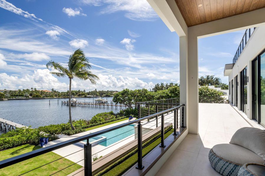 Exterior details and patio area of a home in , Lantana (Image 3).