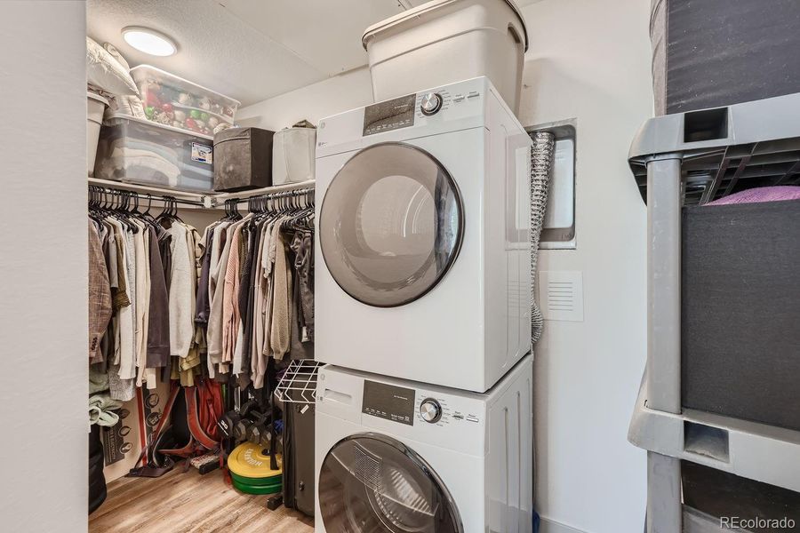 Large closet for storage and full size washer and dryer.