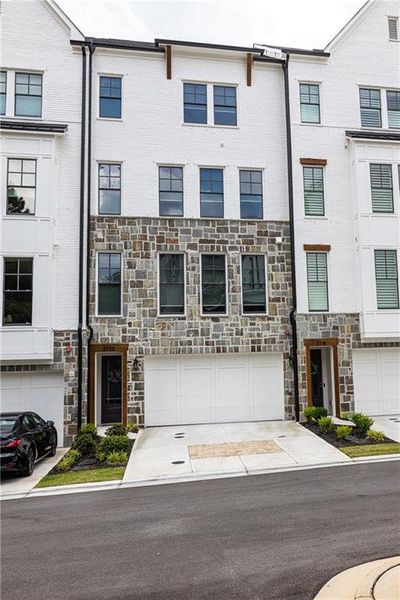 Front exterior of a new home in , Atlanta, GA, highlighting curb appeal (Image 29).