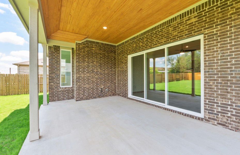 Exterior details and patio area of a home in 6 Creeks, Kyle (Image 3).