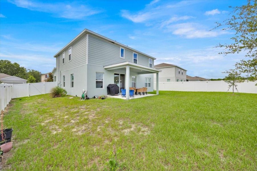 Front exterior of a new home in , Apopka, FL, highlighting curb appeal (Image 1).