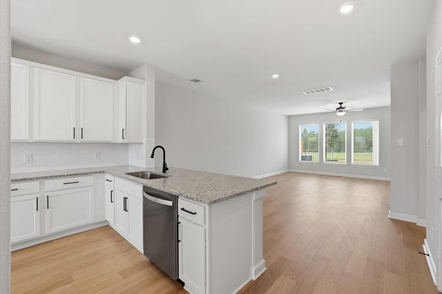 Furnished interior view inside a new home in Magnolia Woods, Magnolia (Image 7). Furnished interior view inside a new home in Magnolia Woods, Magnolia (Image 7).